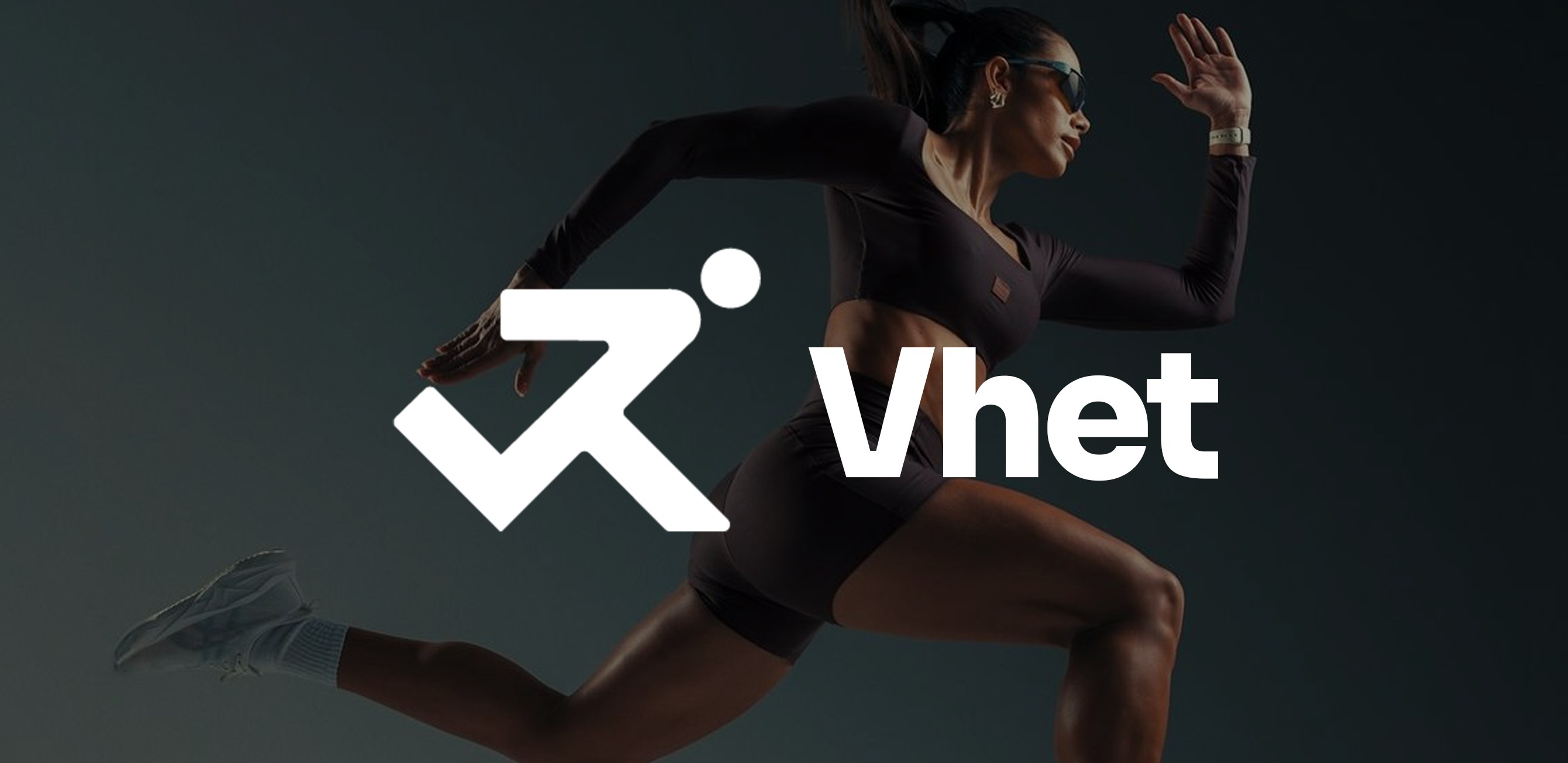 A runner mid-stride, with the Vhet logo